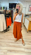 Load image into Gallery viewer, 1.             Shirred Waist Cross Over Leg Trousers-Rust
