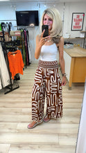 Load image into Gallery viewer, 1.         Abstract Print Shirred Waist Palazzos-Rust
